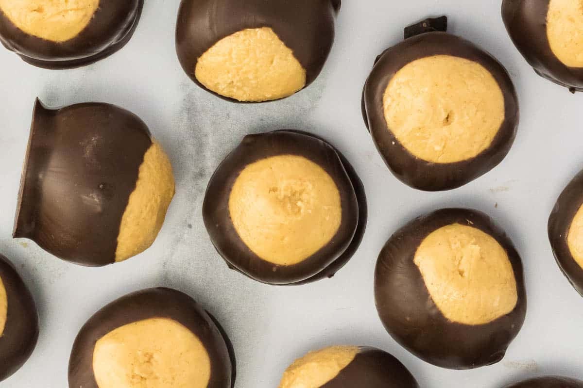 Easy Buckeyes with a creamy peanut butter center dipped in dark chocolate—no oven needed. 