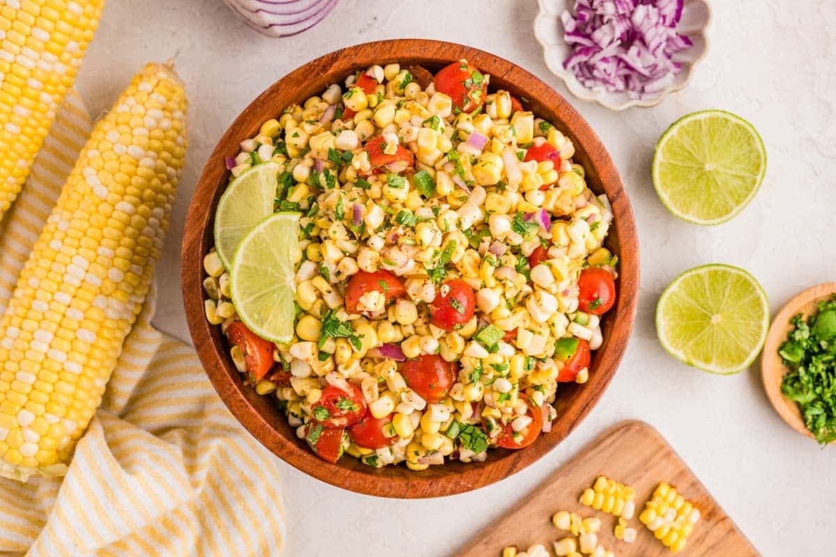 Fresh corn salsa with a quick lime dressing ready in 15 minutes and always a hit.