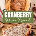 A round loaf of cranberry pecan bread in a dutch oven, with sliced pieces showing cranberries and pecans on a wooden board.