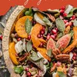 Harvest salad with squash, figs, pomegranate seeds, and nuts in a wooden bowl. Text reads: “Harvest Salad, Thanksgiving Favorite!”.